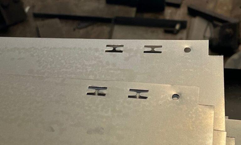 Close-up of Metal Sheets with Punched Holes