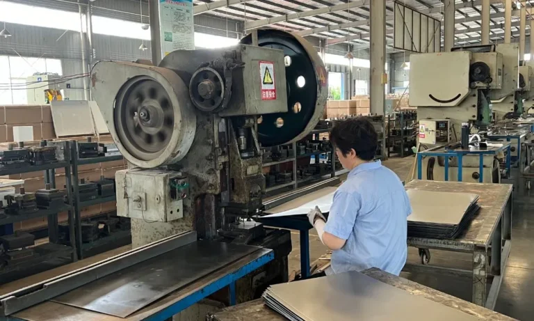 Worker Operating Punching Machine